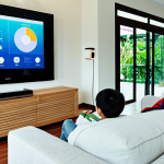 가정용 로봇의 친환경적 요소 - Smart Home Energy Management**

"A modern Malaysian home interior, showing a smart home hub controll...